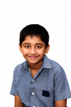 A happy school going kid smiling for you