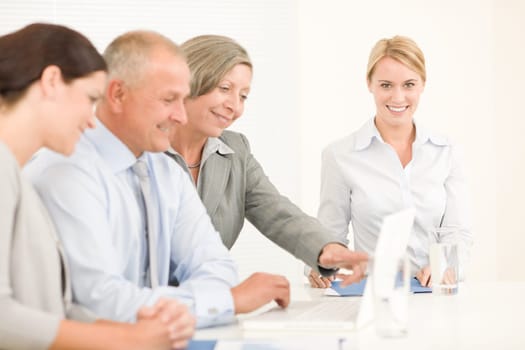 Business team attractive businesswomen with happy colleagues working around table