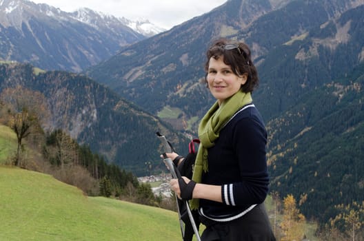 Attractive woman hiking in the mountains