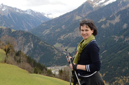 Attractive woman hiking in the mountains