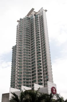 Tall residential apartments touching the blue  sky