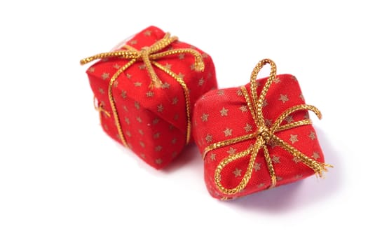 Two red Christmas presents isolated on white