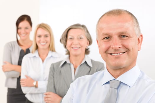 Business team happy mature man with colleagues standing in line