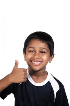 An handsome indian kid looking very excited