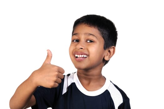 An handsome indian kid looking very excited