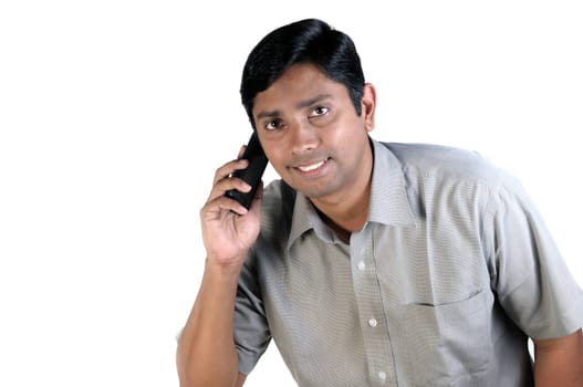 An handsome Indian businessman on call all the time