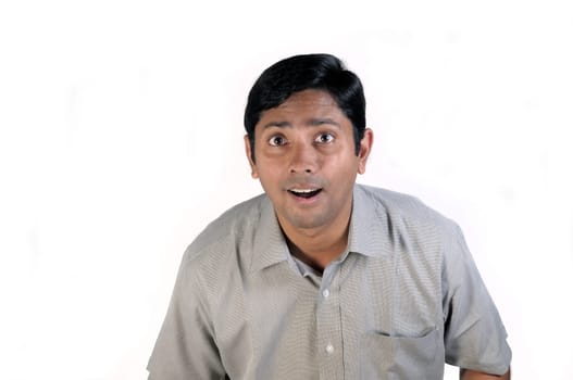 An handsome indian man looking very excited