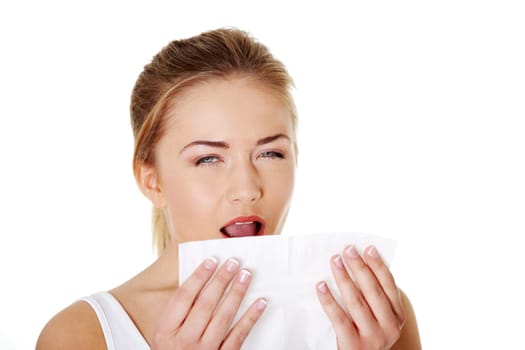 Teen woman with tissue - sneezing