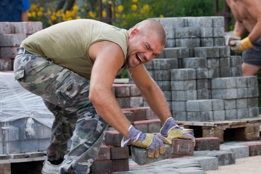 Paver on job. Constructing a new street