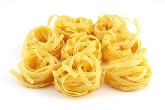 Tagliatelle, isolated on white