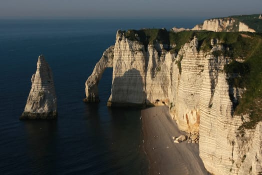 Spectacular cliffs and a natural arch, Etretat, Normandy, France