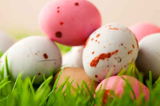 Close-up of pastel colored Easter eggs on grass