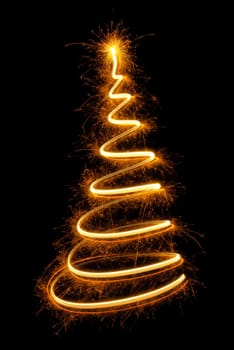Christmas tree as a smart spiral,drawn with light on black