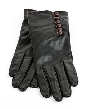 Black pair of leather female gloves isolated on white background