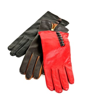 Assorted leather female gloves isolated on white background