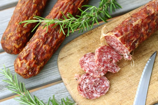 3 sausages - sliced with rosemary