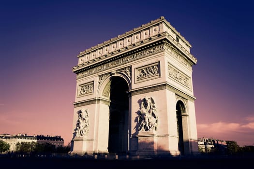 Paris, Arc de Triomphe in the evening