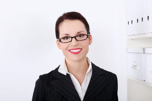 Beautiful caucasian smiling businesswoman in the office.