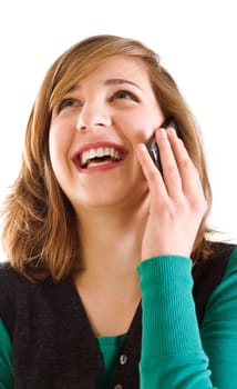 Happy young woman speaking on mobile phone