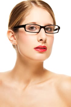 Portrait of a young woman with glasses and red lips on a white background