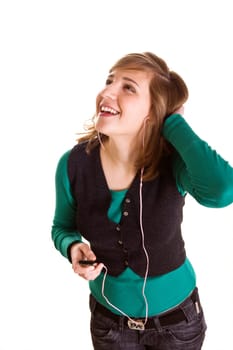 Happy teenager girl with mp3 player listening music