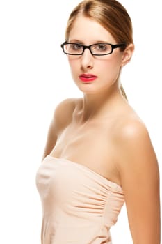 Young woman with glasses and beige shirt on white background