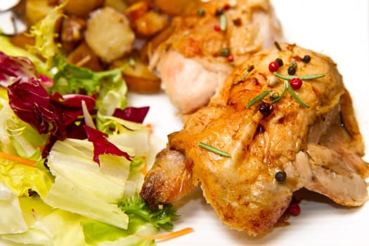 Roast chicken with salad and potatoes