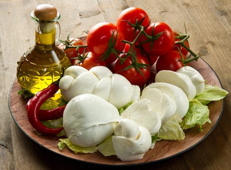 a fresh italian mozzarella  with tomato