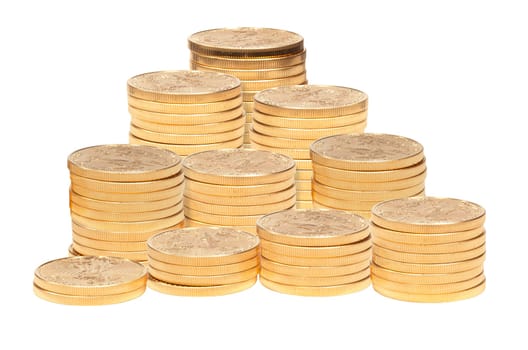 Gold Eagle one ounce coins stacked into larger columns and isolated against white