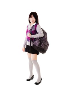 Female Chinese student with a backpack on a white background.