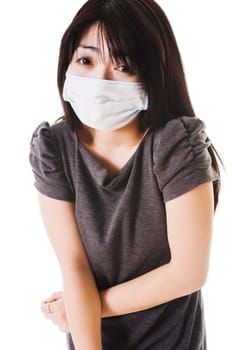 Closeup of a sick fashionable Chinese woman wearing a face mask.
