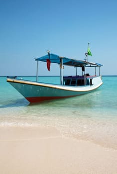 Boat on a beach in Karimunjawa, Indonesia