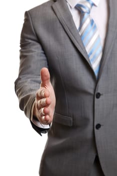 Successful businessman offering a handshake to confirm the deal