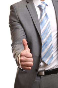 Businessman giving thumbs-up sign