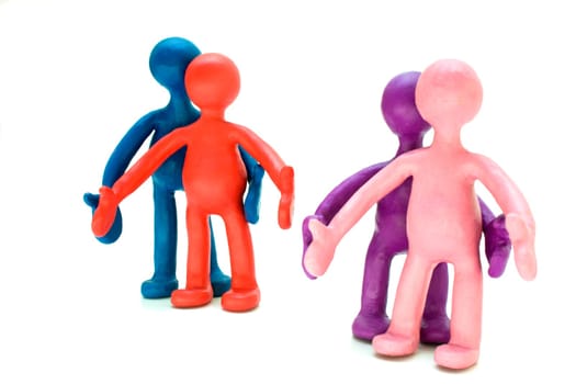 A plasticine puppets pair standing near each other