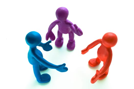 Look above talking plasticine puppets on white background