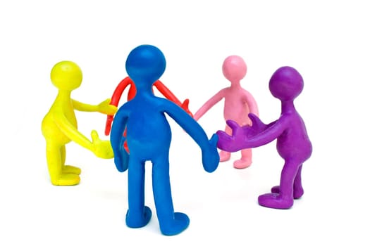 Look on discussing group of plasticine colored puppets