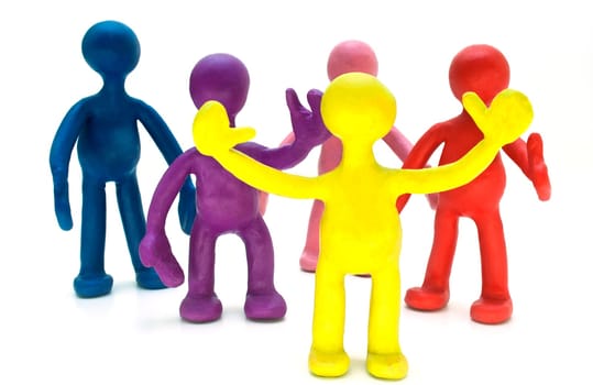 A group of plasticine puppets on white background