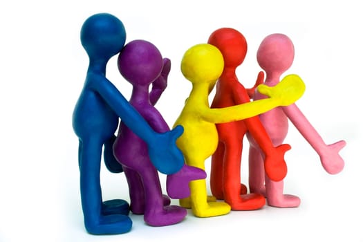 Dancing group of plasticine puppets on white background