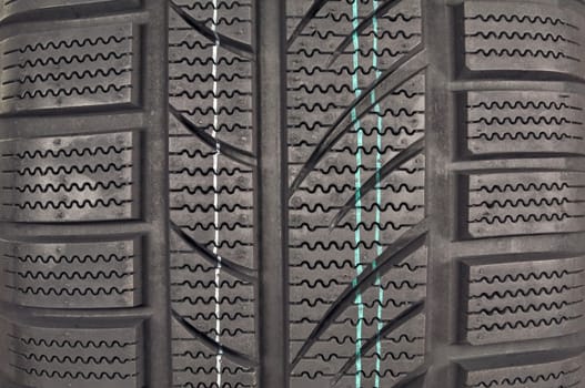 New winter tire pattern close up.