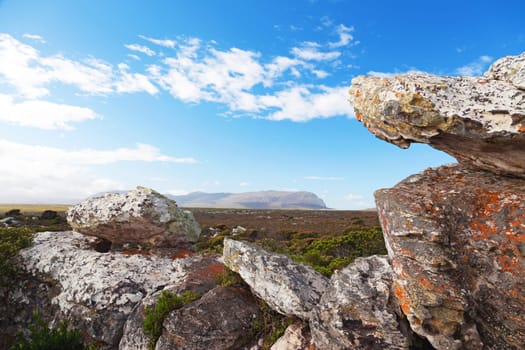 Dreamlike rocky landscape with blue sky