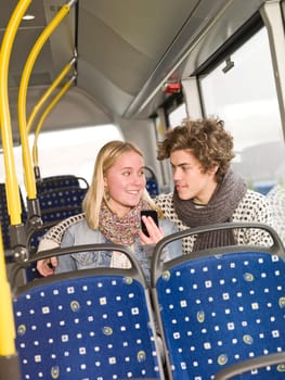 Young couple alone on the bus