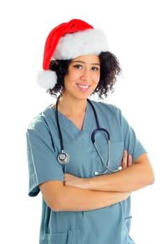 African American Hospital Nurse Wearing A Santa Hat And Hospital Scrubs At Christmas