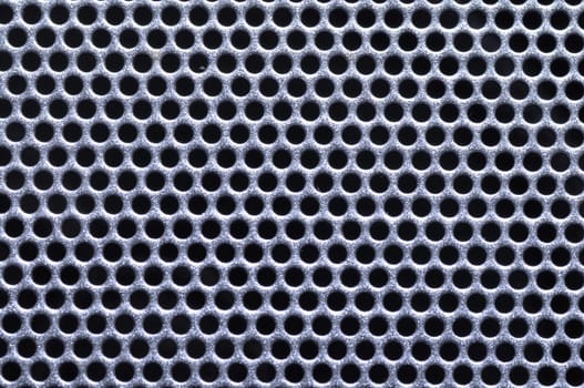 shiny silver metal pattern with reflective round holes