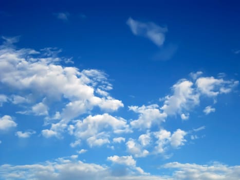 White clouds against blue sky