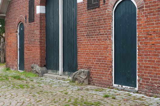 classical dutch farm house with authentic green doors