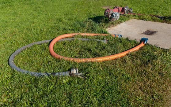 two large industrial water hoses