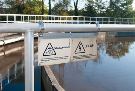 shield on a waste water plant warning for the rotating propeller in the bassin