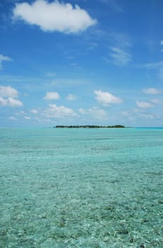 beautiful photo of a maldivian island with a great waterview and cloudscape