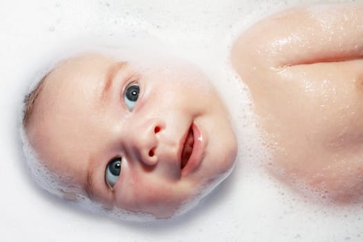 bath and newborn with foam